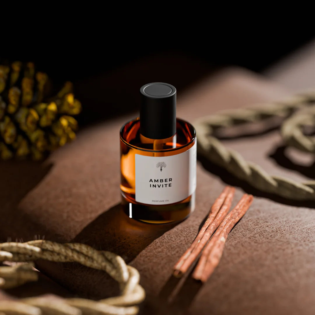 Amber Invite perfume oil bottle with a dropper