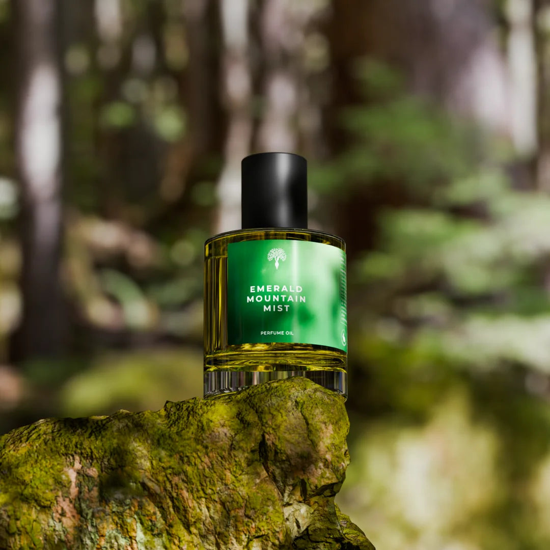 Emerald Mountain Mist perfume oil bottle with a dropper