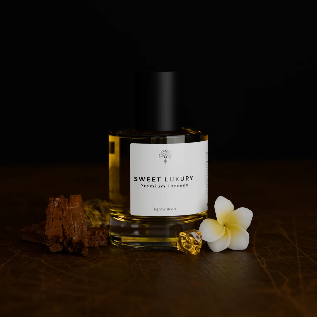 Sweet Luxury Premium Intense perfume oil bottle with a dropper