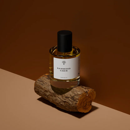 Rainwood Cabin perfume oil bottle with a dropper